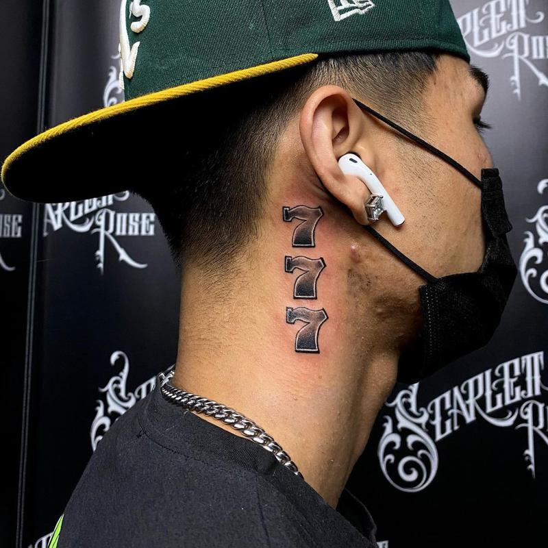 Meaningful Side Neck Tattoos for Guys 1