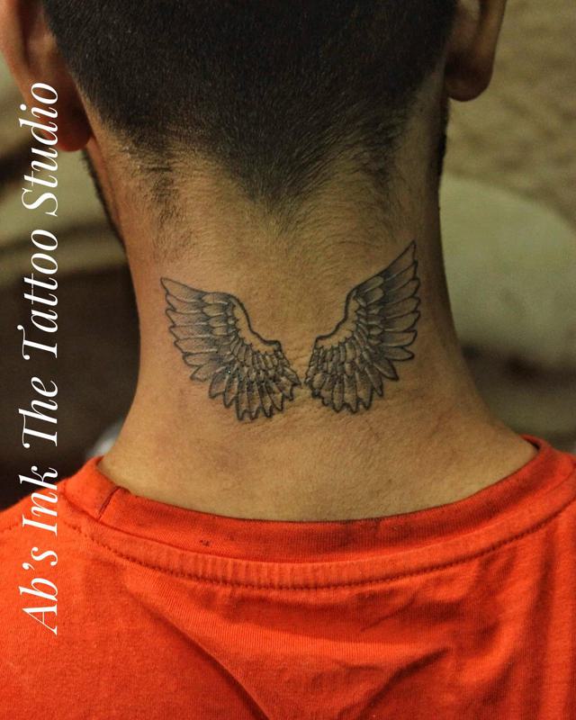 Angel Wing Tattoo on Back of Neck 5