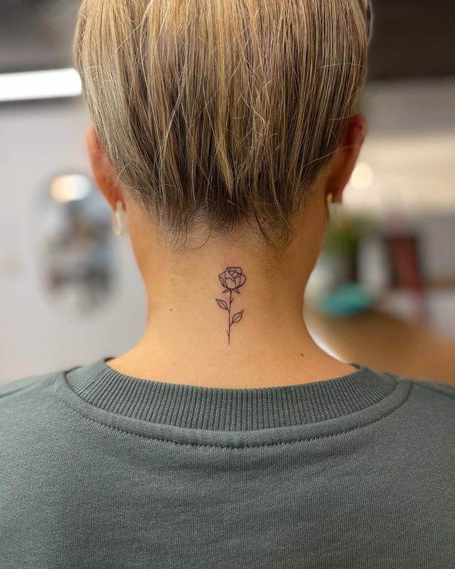 Tattoo tagged with: flower, small, single needle, tiny, back of neck,  ifttt, little, nature, upper back, soltattoo | inked-app.com
