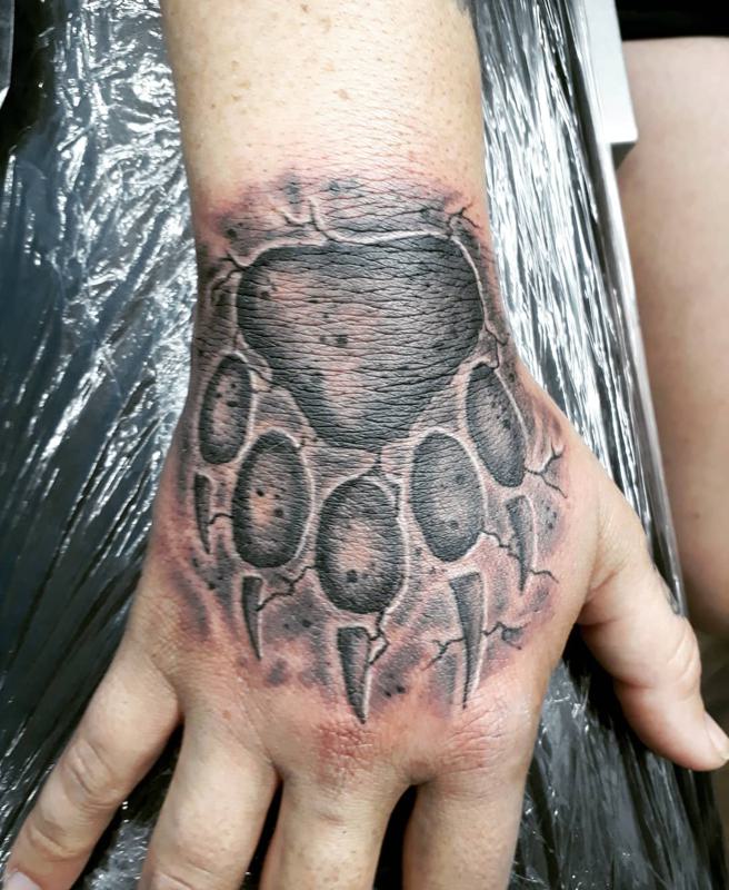 Bear Paw Tattoo on The Hand 5