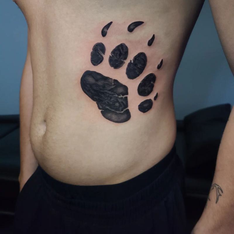 Bear Paw Tattoo on The Rib Side and Hip 2