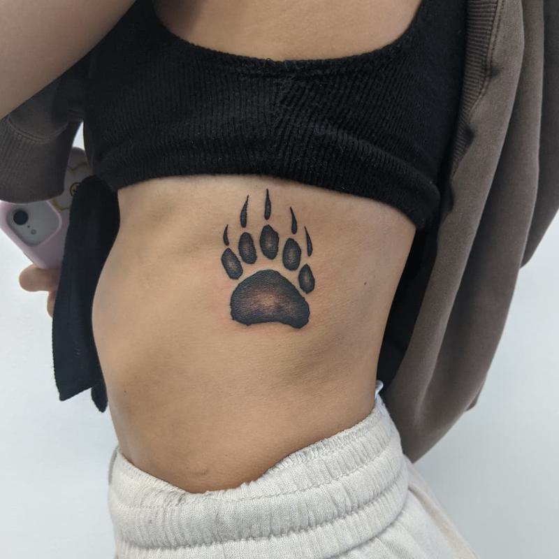 Bear Paw Tattoo on The Rib Side and Hip 3