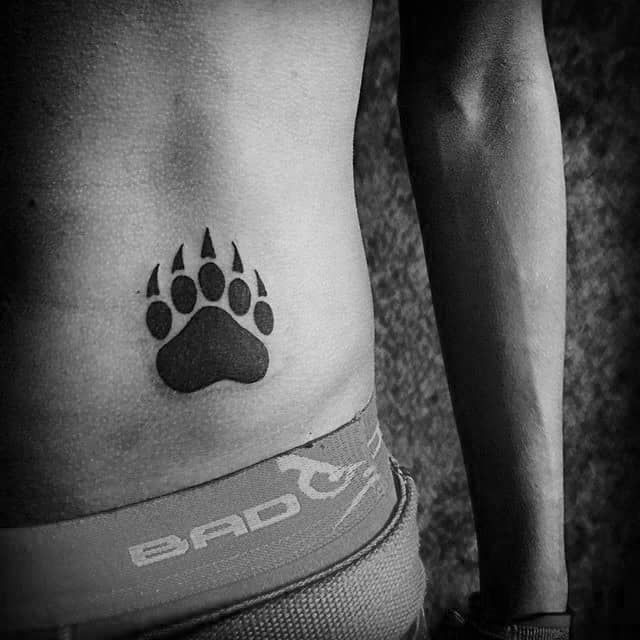 Bear Paw Tattoo on The Rib Side and Hip 4