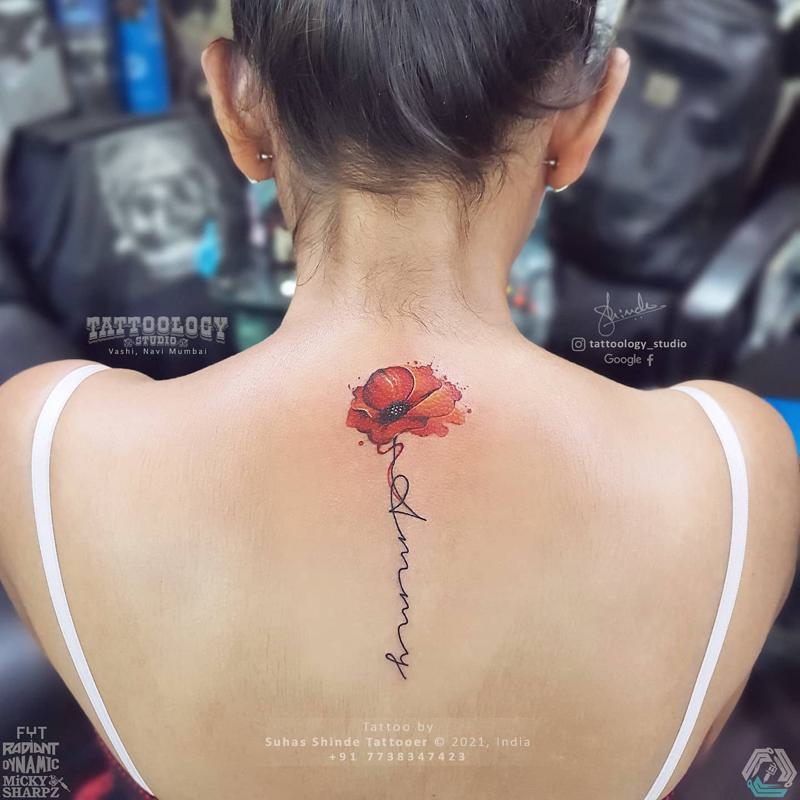 Flower Tattoo on Back of Neck 1