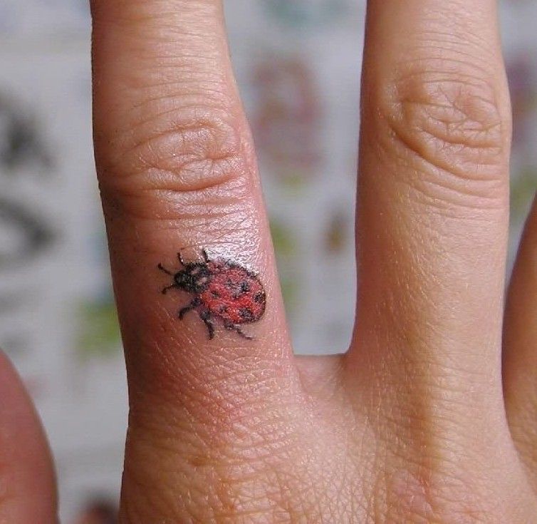 Ladybug Finger Tattoo 2
