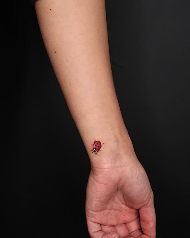 Minimalist or Simple Ladybug Tattoo 2