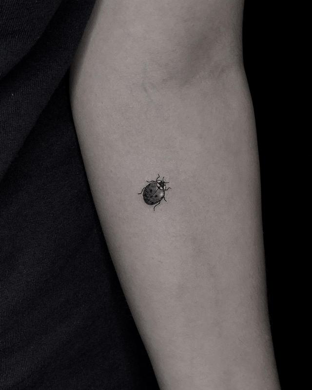Minimalist or Simple Ladybug Tattoo 3