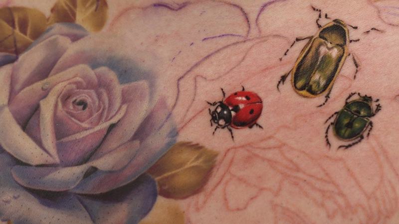 Tiny Ladybug Tattoo 1